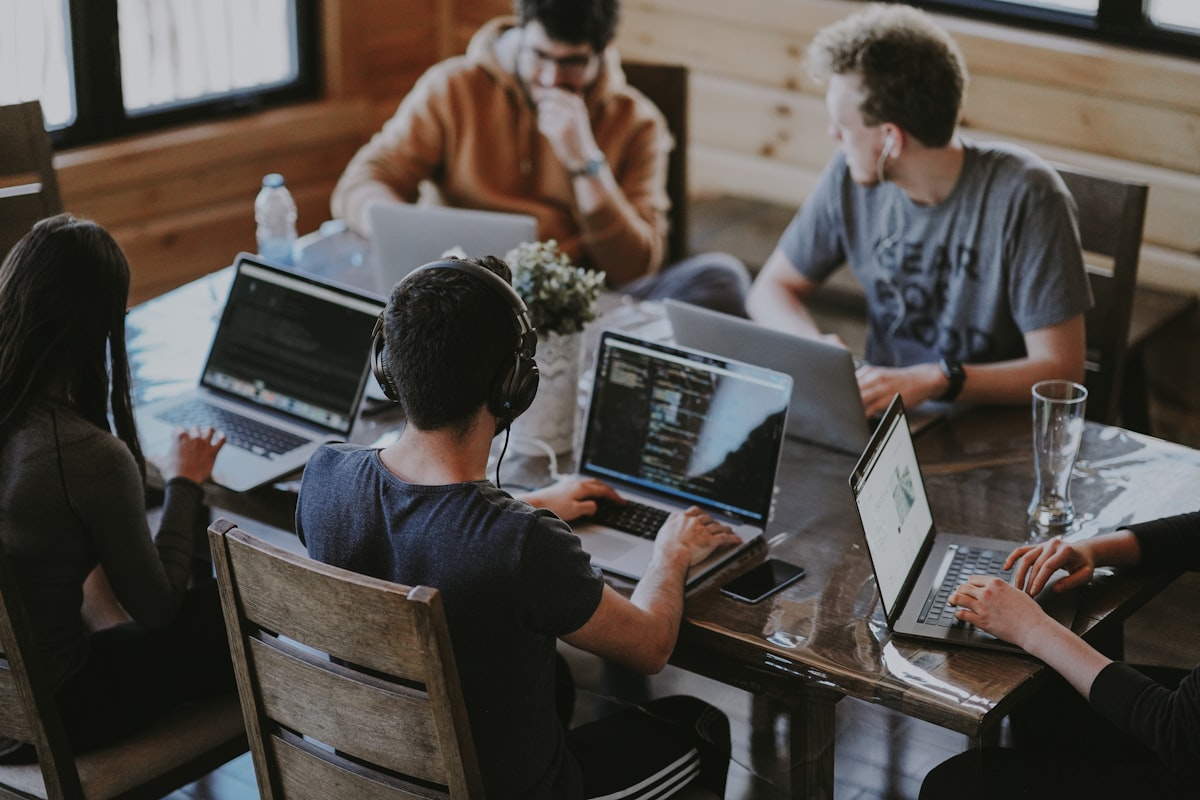 A distributed team on a video call in a bright office