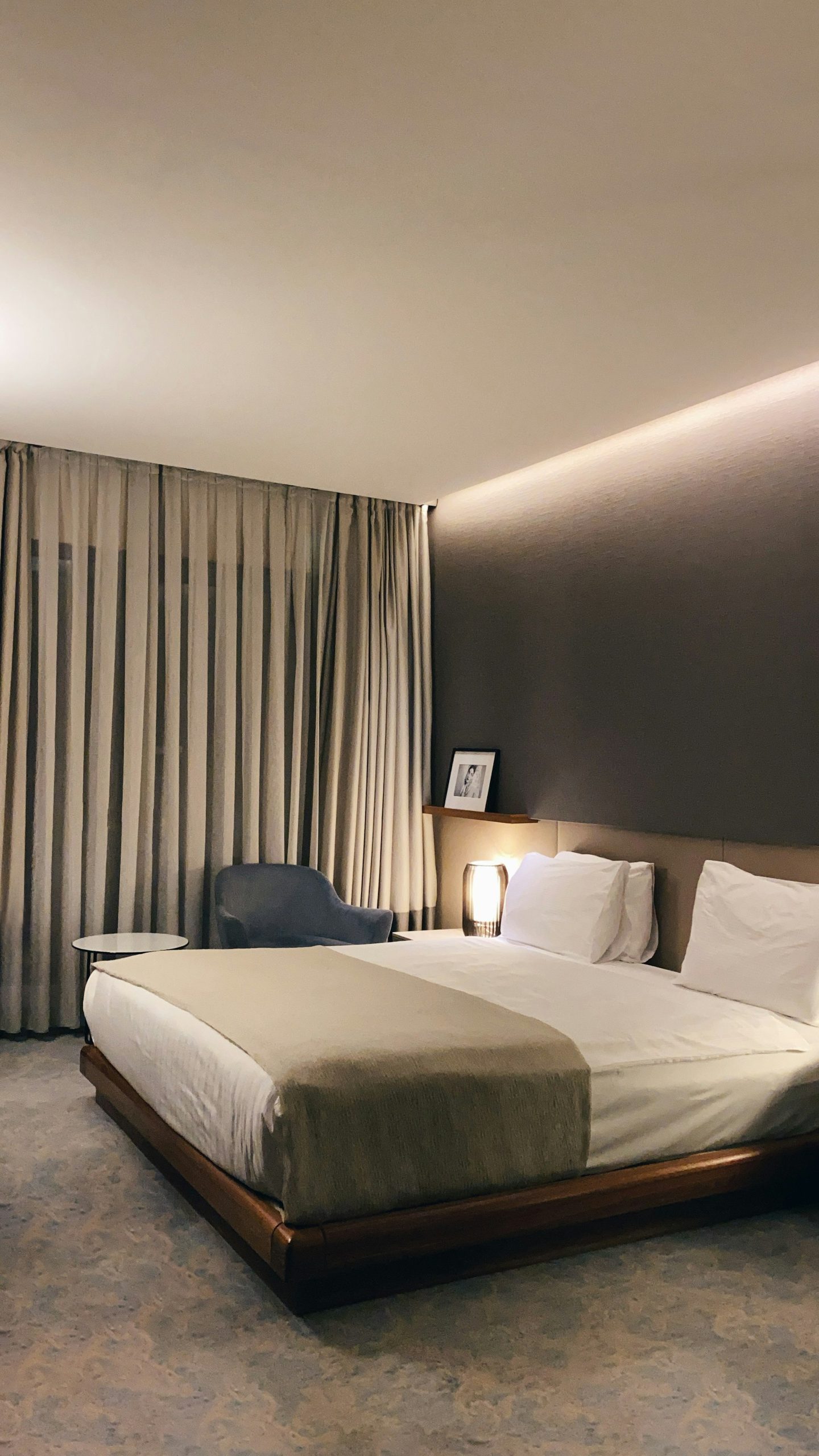 A calm bedroom with white linen