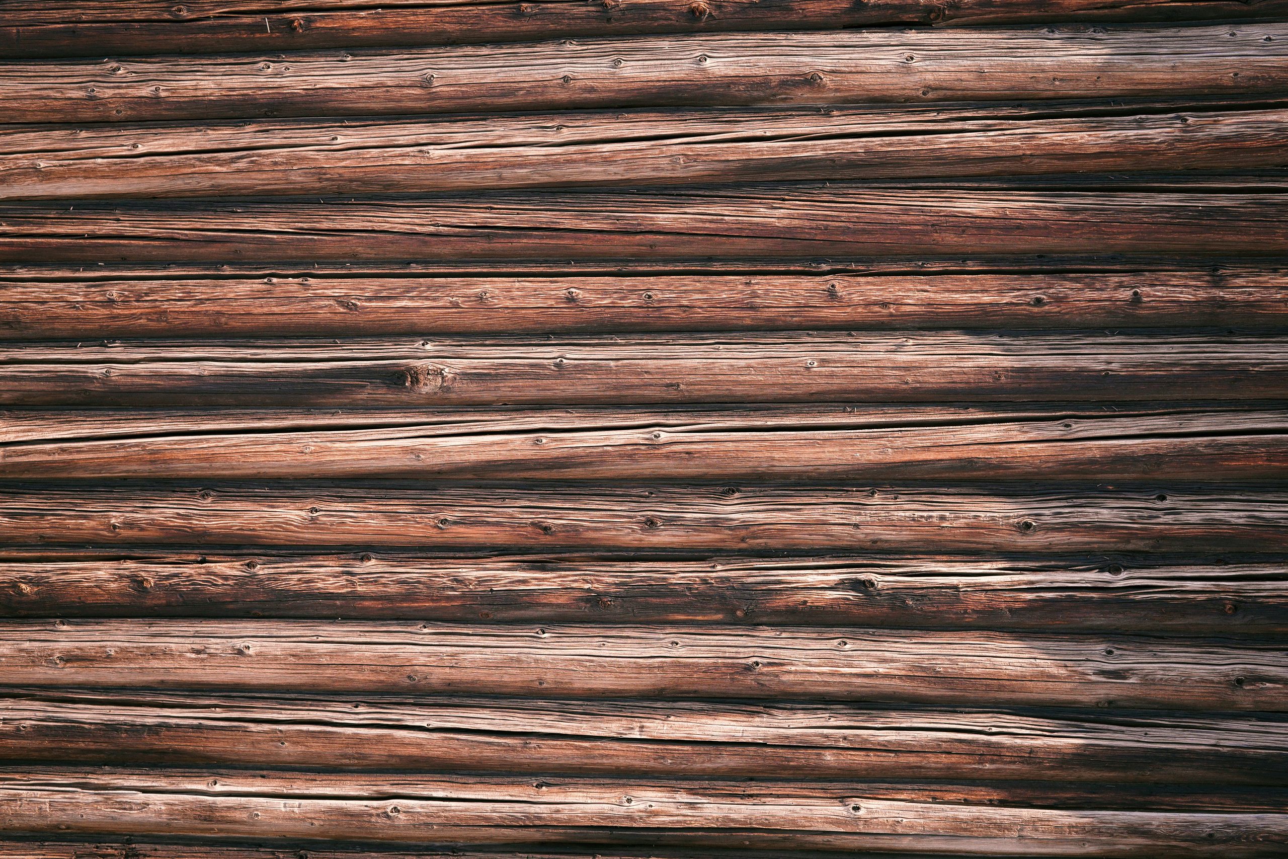 Weathered dark wooden logs