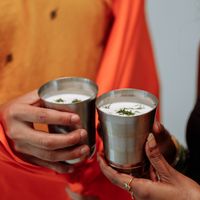 Spiced buttermilk served in steel tumblers