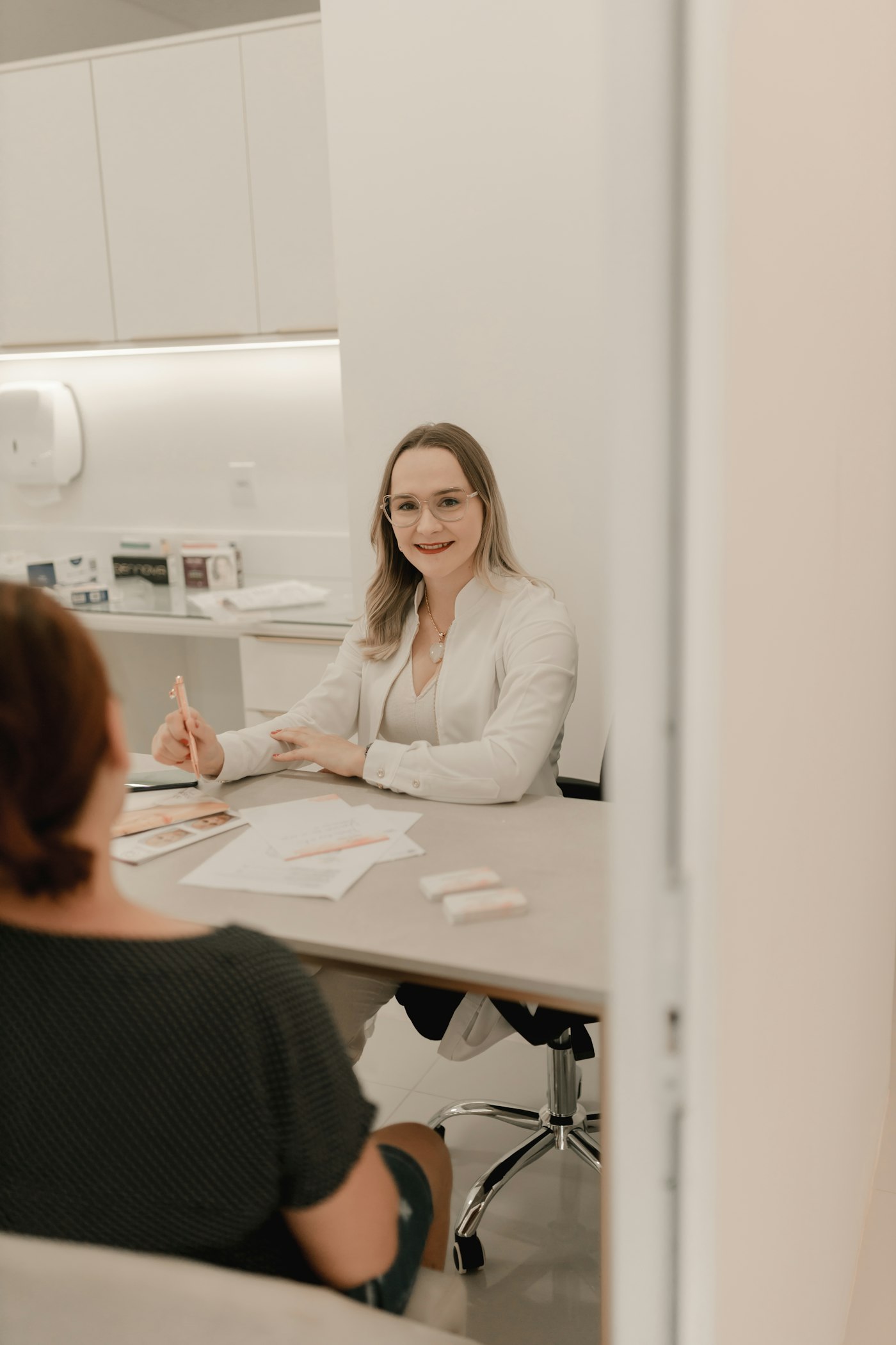 A doctor talking with a patient